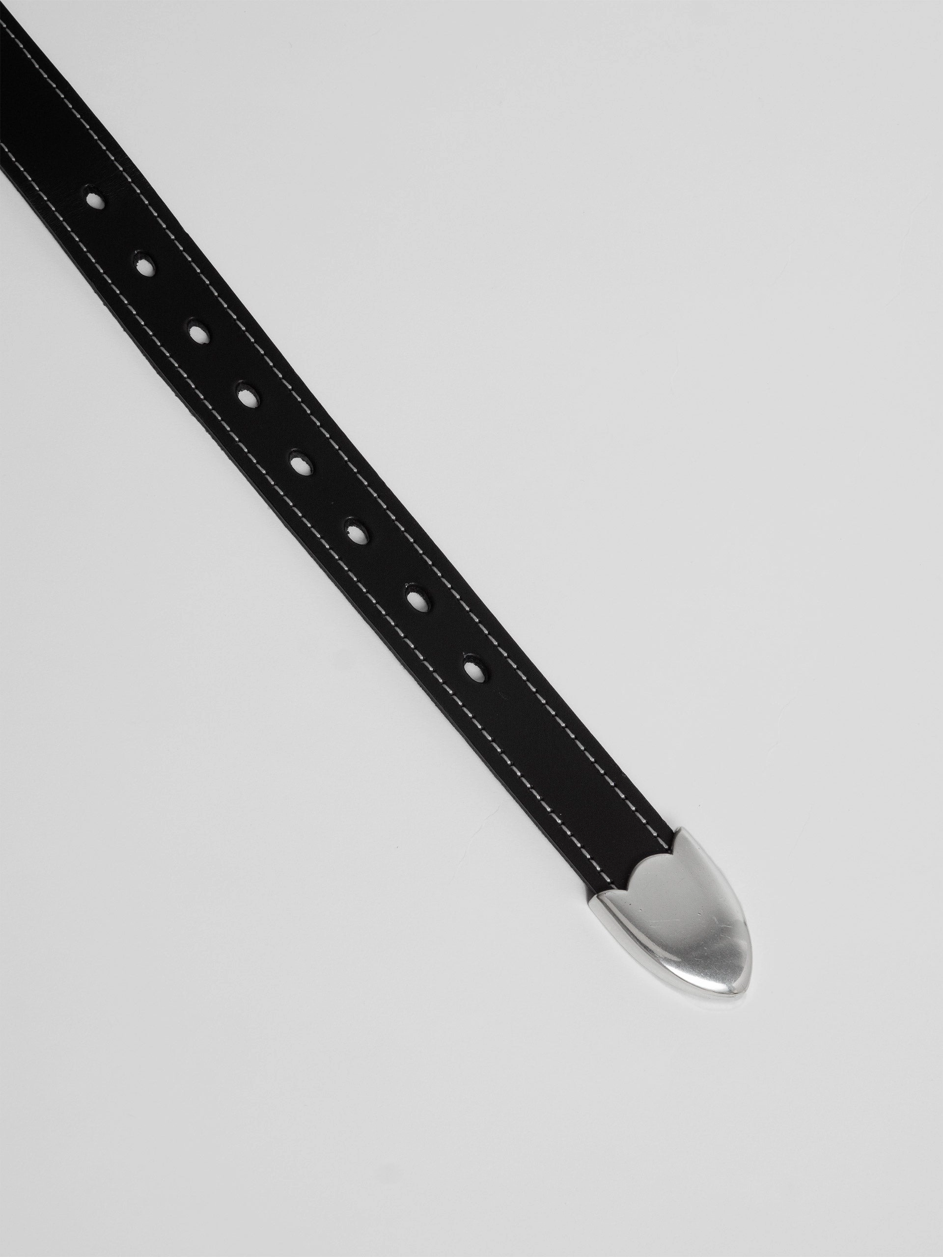 The Lair Claude White Stitch Belt Silver